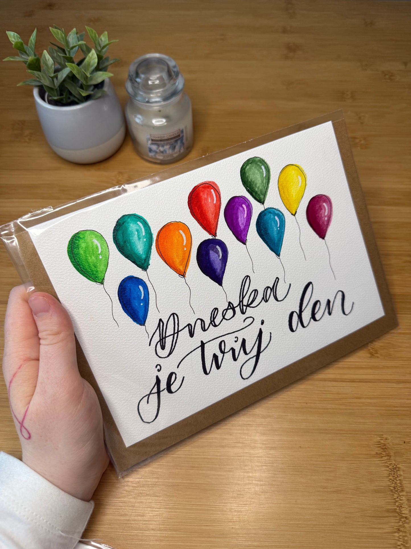 Příníčka s bálónky a papírovou obálkou